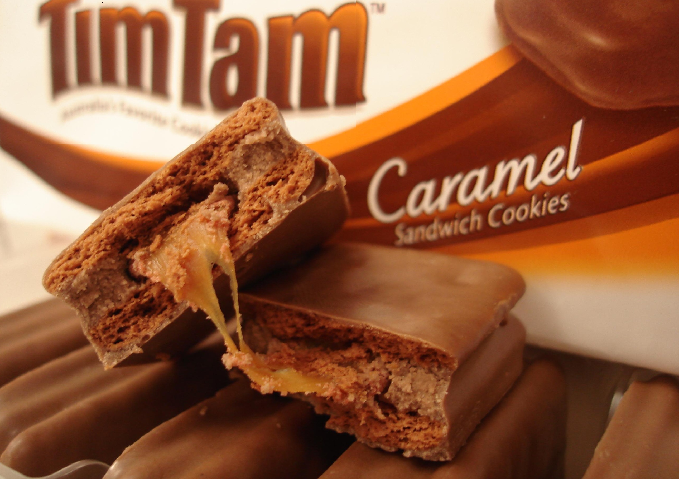 Tim Tams are chocolate covered caramel filled biscuits made in Australia