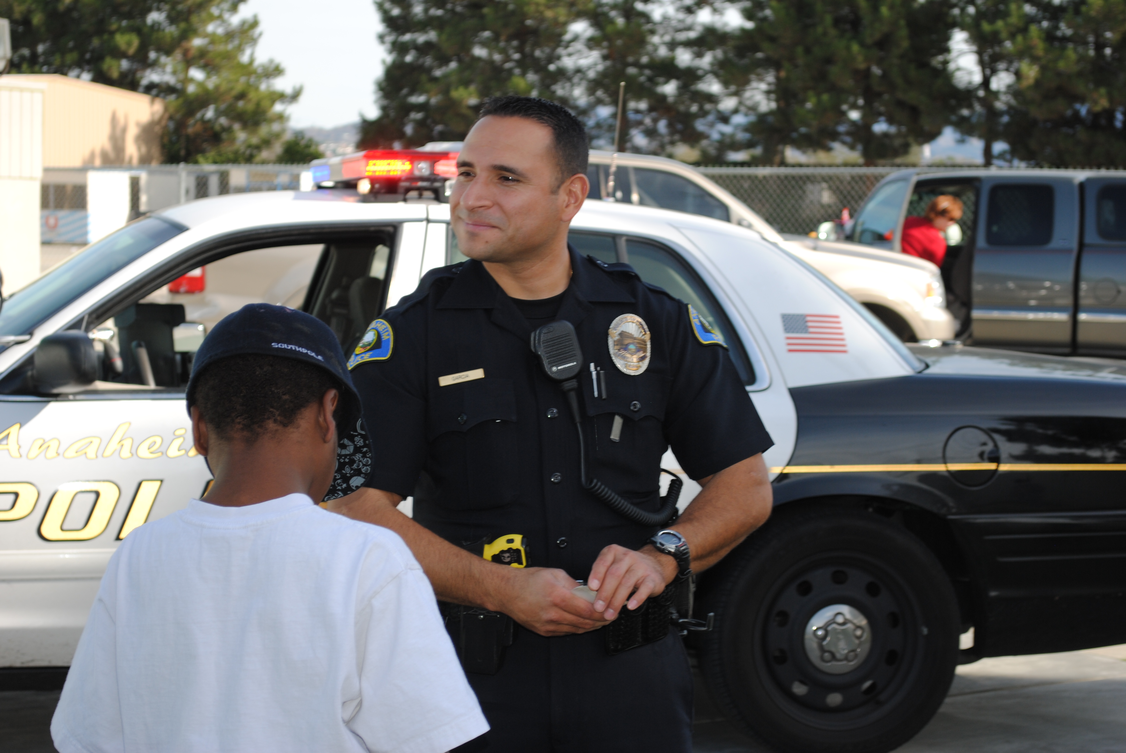 Cop rescuing a child - representative image