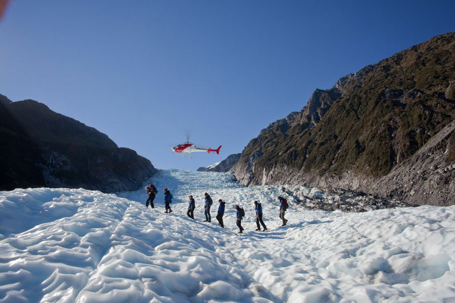 Heli-hiking on Fox Glacier honeymoon destination new zealand