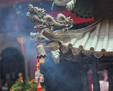 A pictures of dragons in the architecture of the temple