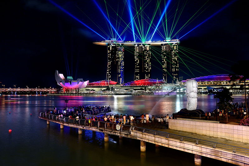 People enjoying the light show at the Marina Bay Sands, which one of the best things to do in SIngapore