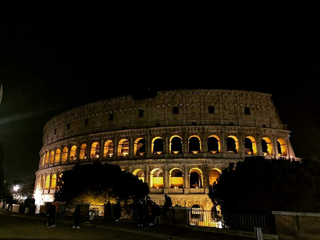 An amazing night view of the Colosseum in lights