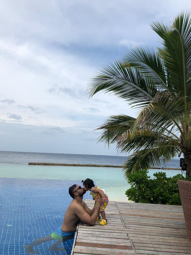 ambrish and his baby at the resort