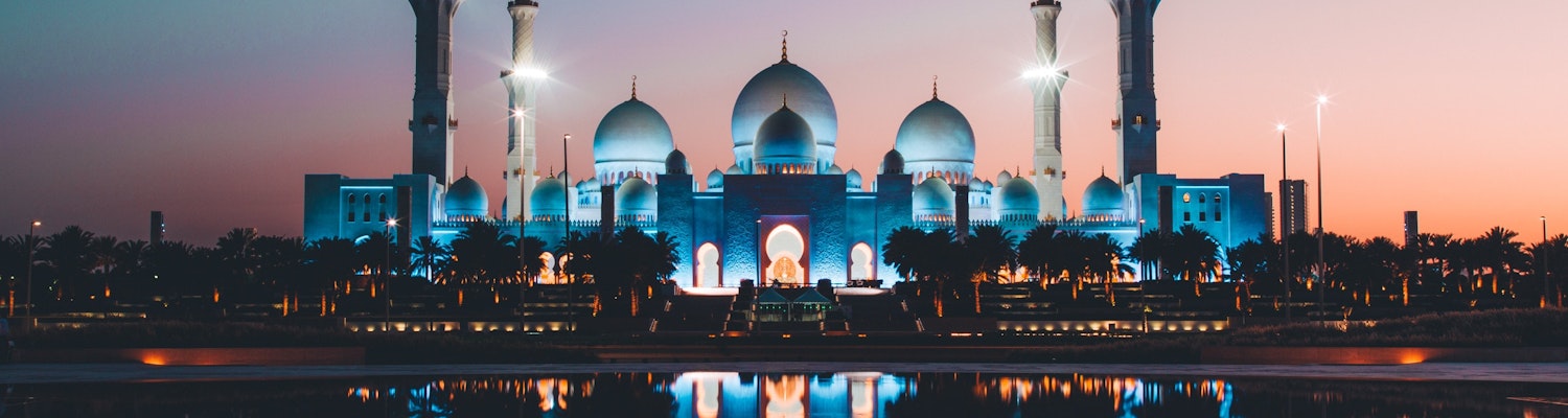 A picturesque night view of the Grand Mosque in Abu Dhabi