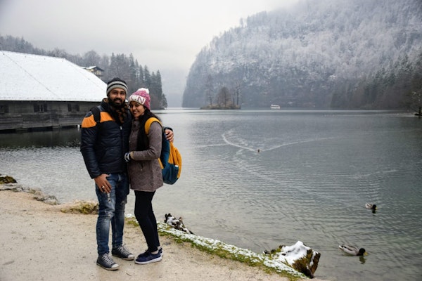 A cute couple posing at King's lake in central Europe