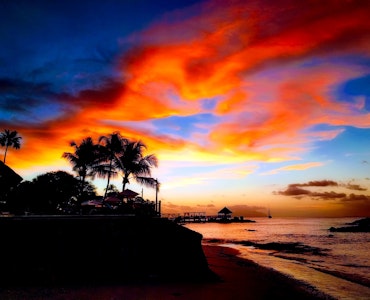 An awe-striking sight of the sunset in Seychelles Island