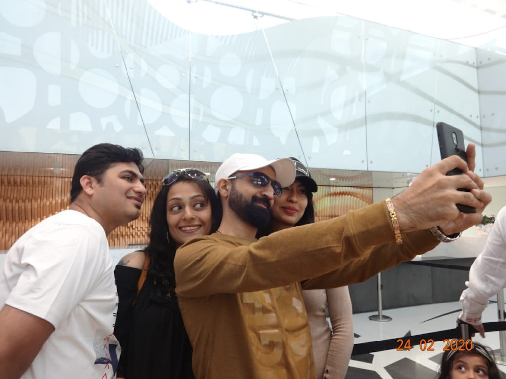 A group of people taking a selfie in Dubai