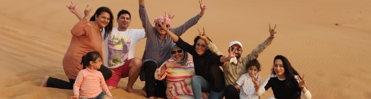 A group of people enjoying at the Desert Safari in Dubai