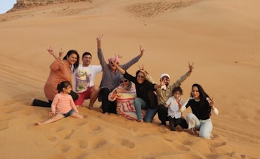 A group of people enjoying at the Desert Safari in Dubai
