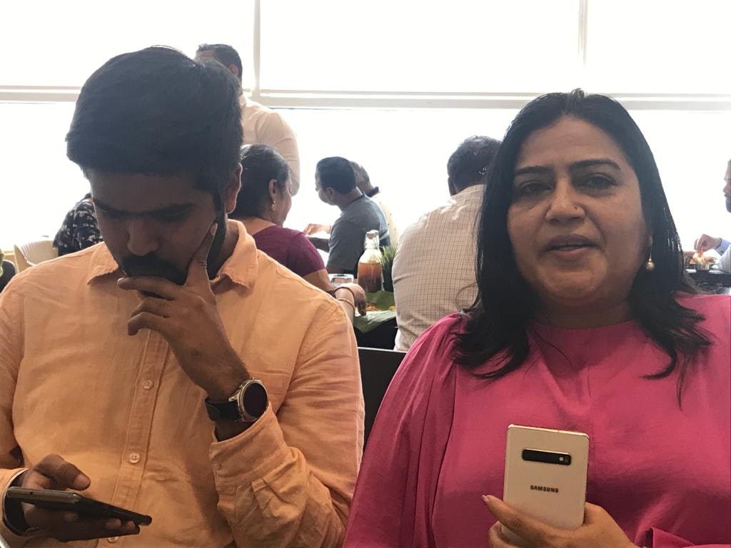 A picture of two people at one of the restaurants