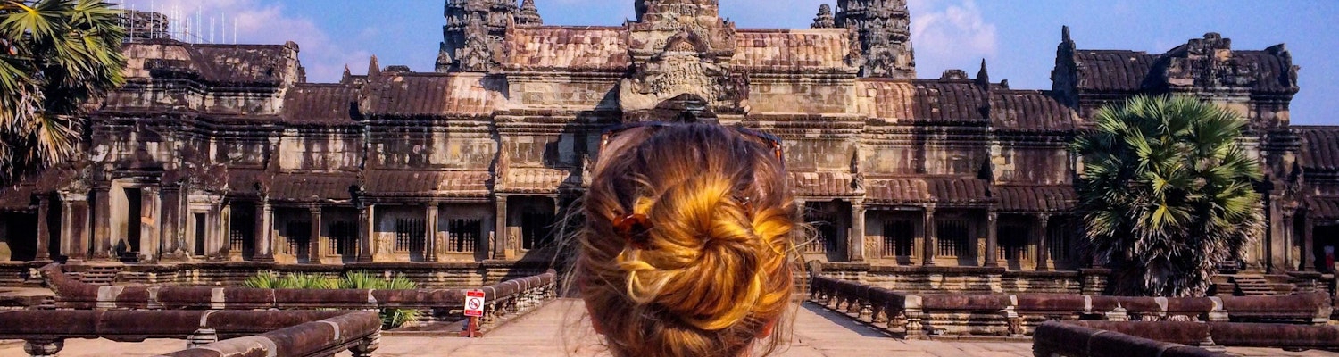 A traveller in front of a famous temple in Cambodia