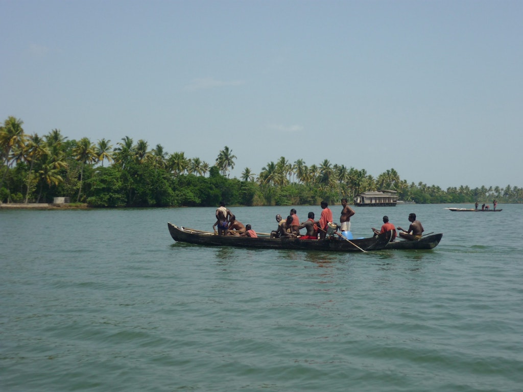 A group of people enjoying a boat ride in Vembanad Lake