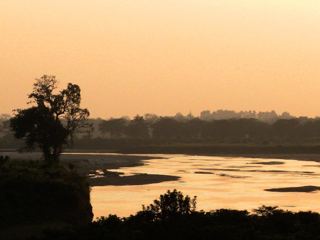 Sunset in Dooars overlooking a river