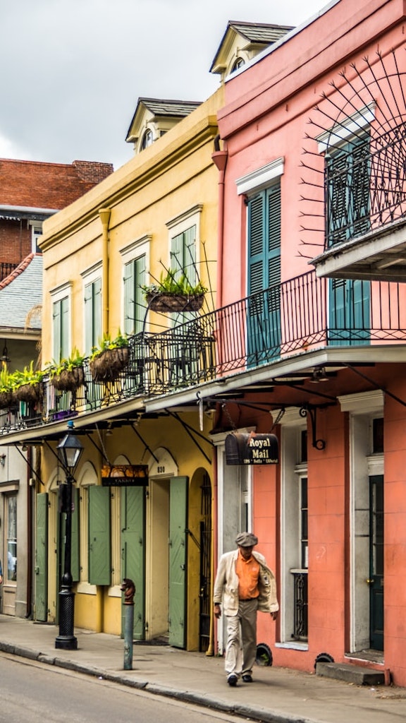 a man walking in the french quarter