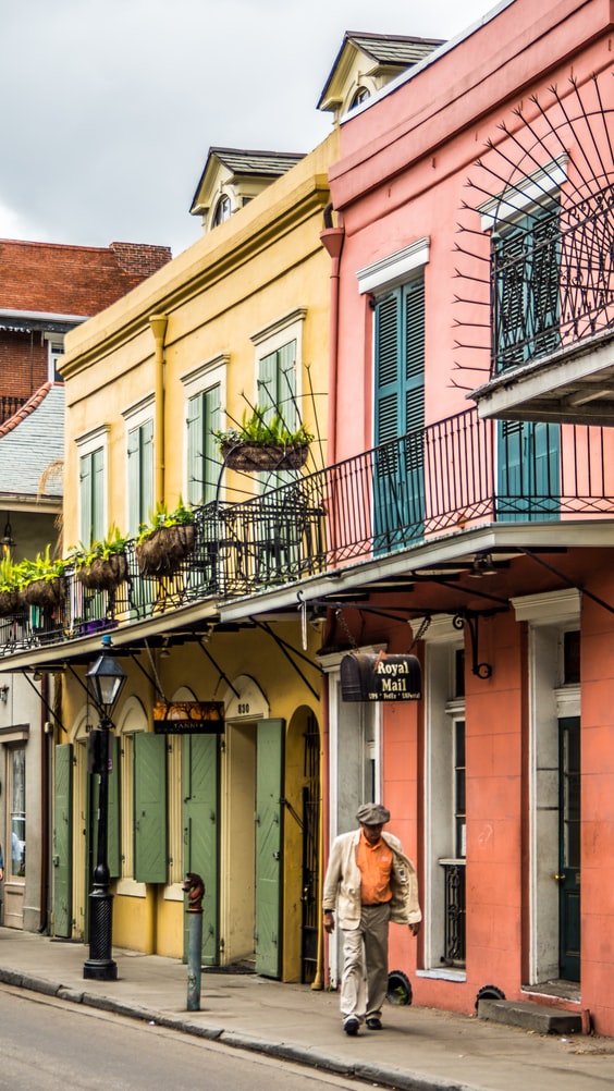 a man walking in the french quarter
