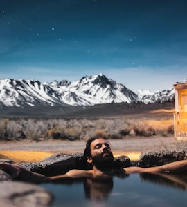 A man relaxing in a hot spring