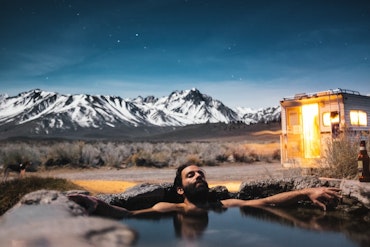 A man relaxing in a hot spring