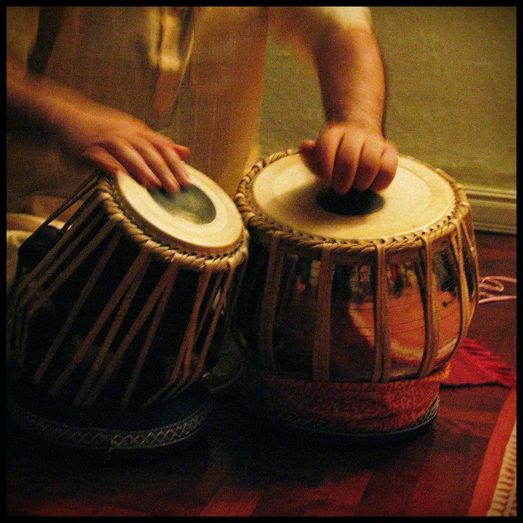 A person playing Tabla