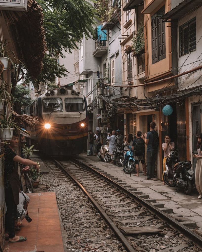rushing train in the Train street in Hanoi