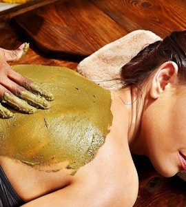 A lady undergoing Ayurveda massage