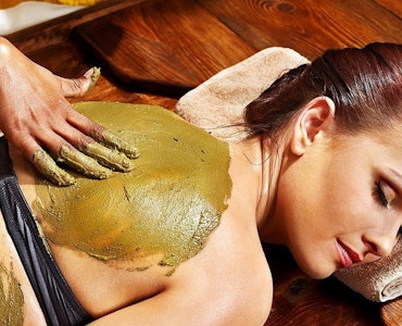 A lady undergoing Ayurveda massage