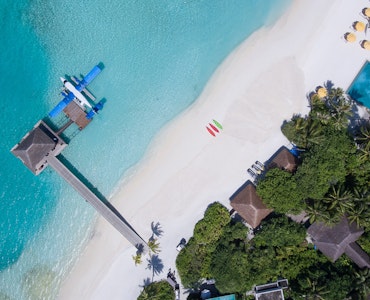 resorts with free transfers in the maldives